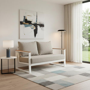 HomeRoots 56" Modern White Polypropylene Sofa for Stylish Living Spaces - Durable, Easy-Clean Comfort for Two 667654