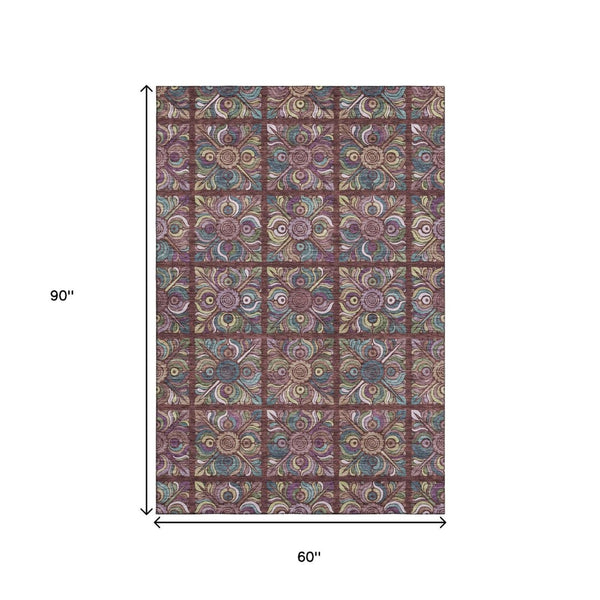 HomeRoots 5' X 8' Medallion Area Rug in Rust, Purple & Teal - Washable, UV Protected, Perfect for High-Traffic Spaces 667705