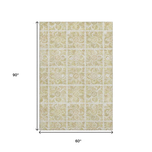 HomeRoots 5' X 8' Beige and Tan Medallion Area Rug - Washable, UV Protected, Stain Resistant for High Traffic Use 667761