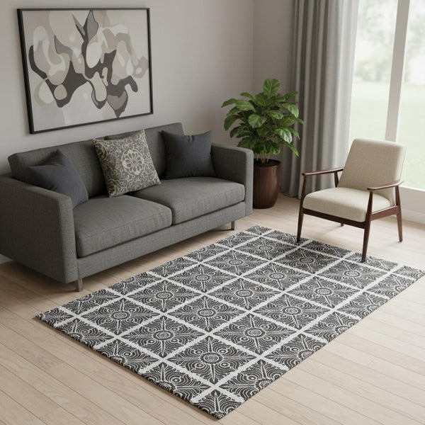 HomeRoots 5' X 8' Ivory and Black Medallion Area Rug – Stylish, Washable, UV-Protected for Family Spaces 667773