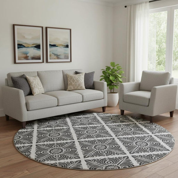 HomeRoots 8' Ivory and Black Medallion Washable Round Rug - Durable, Stylish, UV-Resistant, Easy Care Solution! 667774