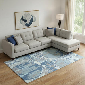 HomeRoots 9' x 12' Geometric Blue Gray and Ivory Washable Area Rug with UV Protection for High-Traffic Spaces 667818