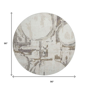 HomeRoots 8' Ivory Taupe & Beige Geometric Washable Round Rug – Durable, UV Protected, Easy-Clean Design 667834