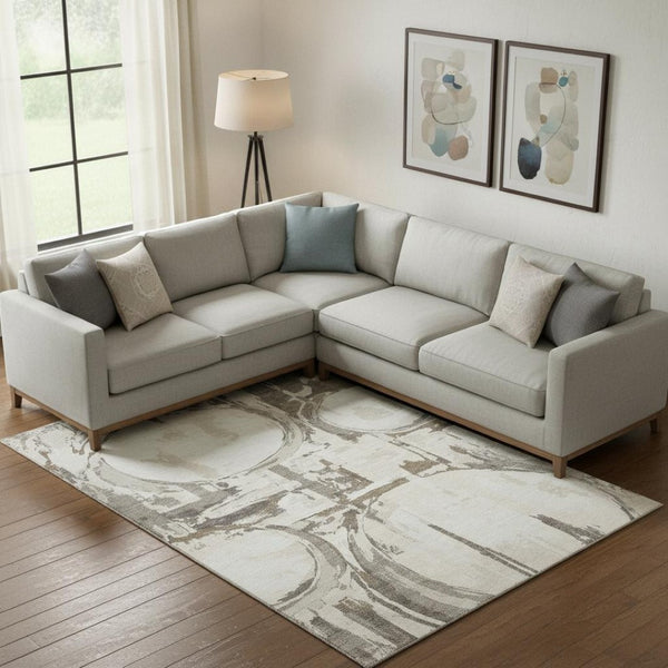 HomeRoots 10' Stylish Washable Area Rug in Ivory, Taupe & Beige with UV Protection for Modern Spaces 667837
