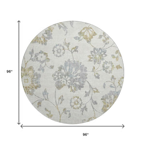 HomeRoots 8' Ivory Gray & Gold Floral Round Rug - Washable, UV Protected, Stain Resistant for Elegant Home Decor 667918
