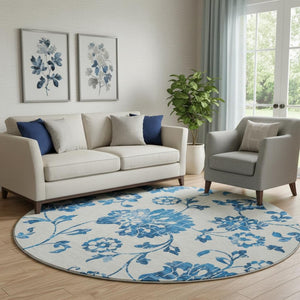 HomeRoots 8' Washable Round Rug with White and Blue Floral Design - UV Protected, Stain Resistant, Durable! 667954