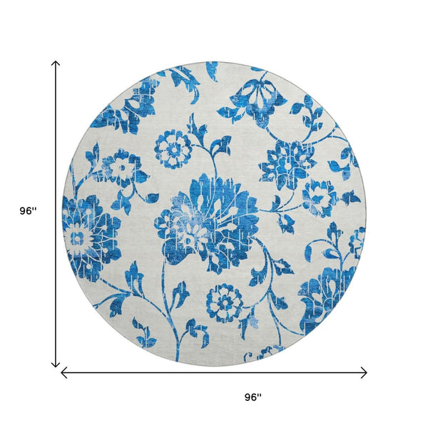 HomeRoots 8' Washable Round Rug with White and Blue Floral Design - UV Protected, Stain Resistant, Durable! 667954