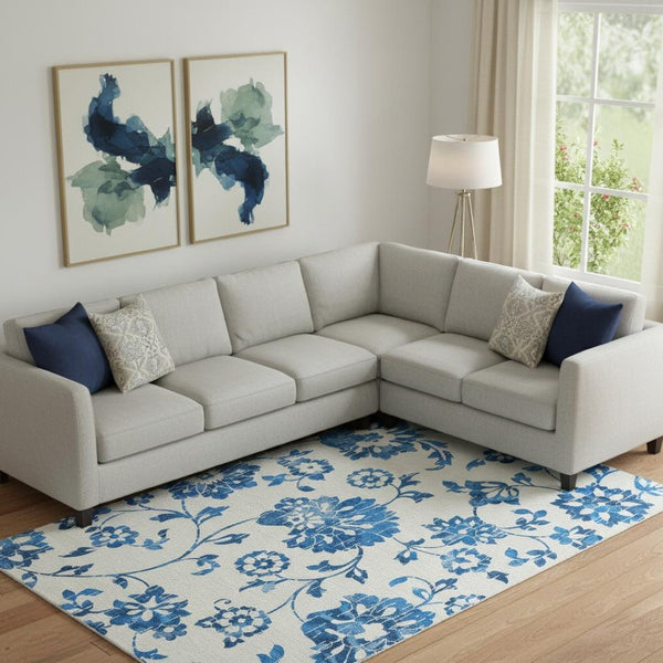 HomeRoots 9' X 12' Floral Washable Area Rug - Blue and White, UV Protection, Stain Resistant, Perfect for Families 667956