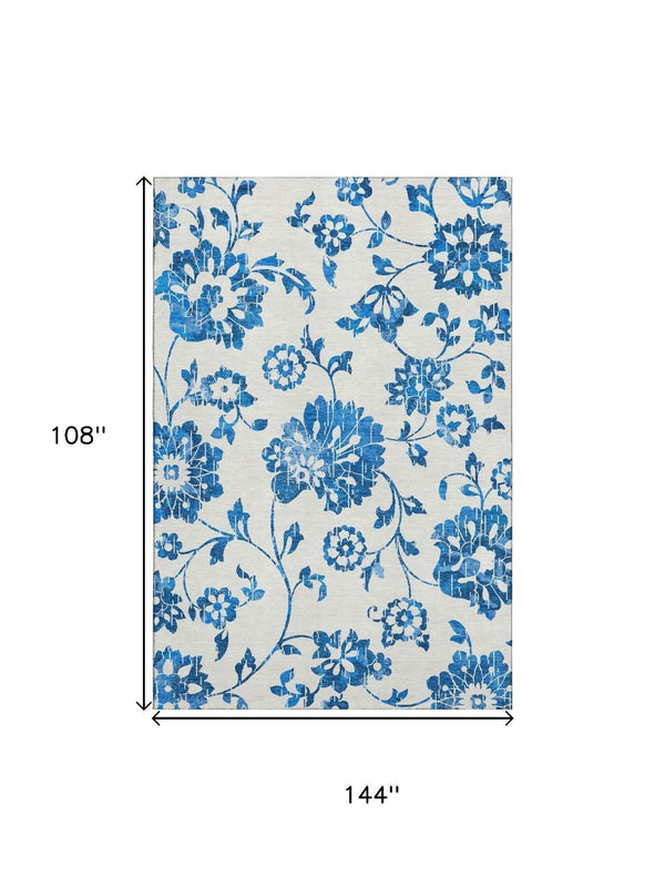 HomeRoots 9' X 12' Floral Washable Area Rug - Blue and White, UV Protection, Stain Resistant, Perfect for Families 667956