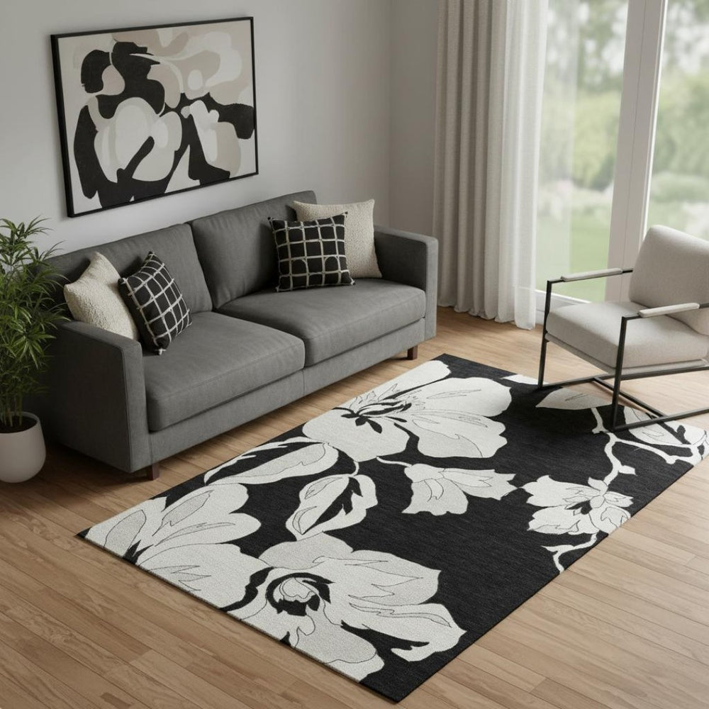 HomeRoots 5' X 8' Black And Ivory Floral Area Rug - Durable, Washable, UV-Protected for High-Traffic Spaces 667965