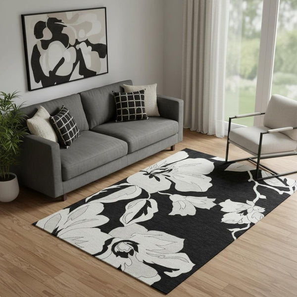 HomeRoots 5' X 8' Black And Ivory Floral Area Rug - Durable, Washable, UV-Protected for High-Traffic Spaces 667965