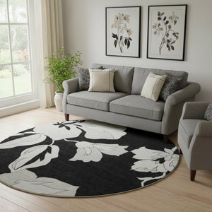 HomeRoots 8' Black and Ivory Floral Washable Round Rug – Durable, UV Protected, Perfect for Busy Homes & Décor 667966