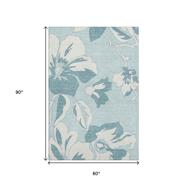 HomeRoots 5' X 8' Teal and Ivory Floral Area Rug - Durable, Washable, Stain Resistant with UV Protection! 668019