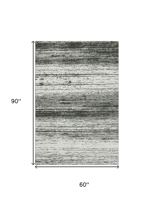 HomeRoots 5' X 8' Black And Ivory Striped Washable Area Rug – UV Protected, Durable, Easy-Care Style for Homes 668097