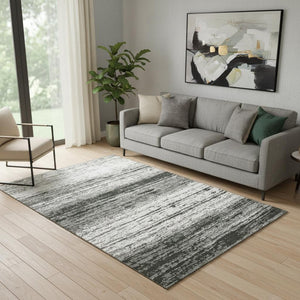 HomeRoots 5' X 8' Black And Ivory Striped Washable Area Rug – UV Protected, Durable, Easy-Care Style for Homes 668097