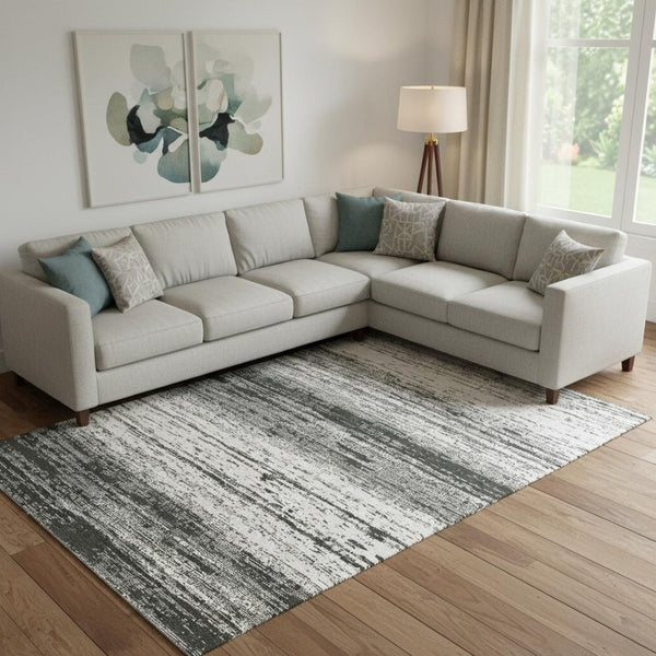 HomeRoots 9' X 12' Black And Ivory Striped Area Rug - Durable, Washable, UV-Protected for Indoor & Outdoor Use 668100