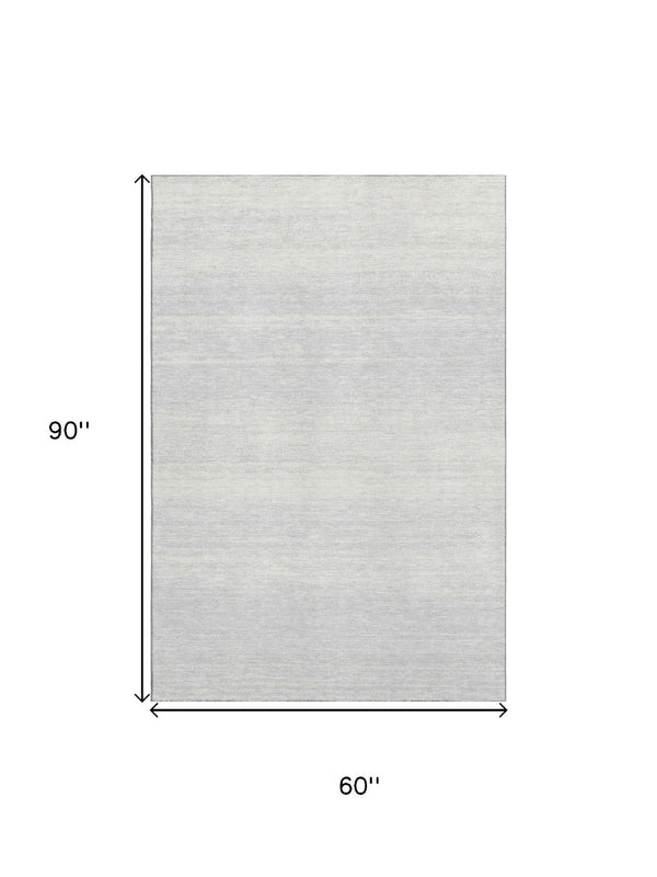 HomeRoots 5' X 8' Modern Silver and Gray Striped Washable Area Rug with UV Protection for Easy Care & Durability 668183