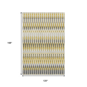HomeRoots 10' X 14' Southwestern Washable Area Rug in Gold, Gray & Beige - UV Protected for Active Homes 668241