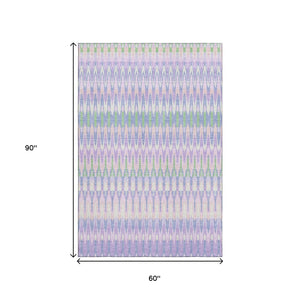 HomeRoots 5' X 8' Southwestern Washable Area Rug in Lavender Pink & Green - UV Protected & Stain Resistant! 668255
