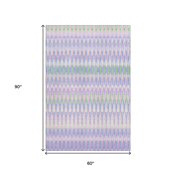 HomeRoots 5' X 8' Southwestern Washable Area Rug in Lavender Pink & Green - UV Protected & Stain Resistant! 668255