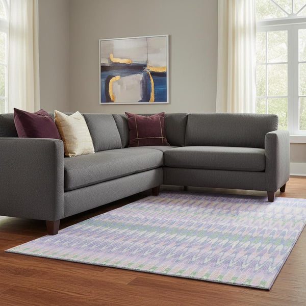 HomeRoots 9' X 12' Southwestern Area Rug in Lavender Pink & Green - Washable, UV Protected, Stain Resistant 668258