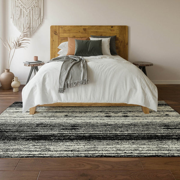 HomeRoots 5' X 8' Black And Ivory Striped Area Rug - Washable, Durable, UV-Protected for Homes with Kids & Pets 668309