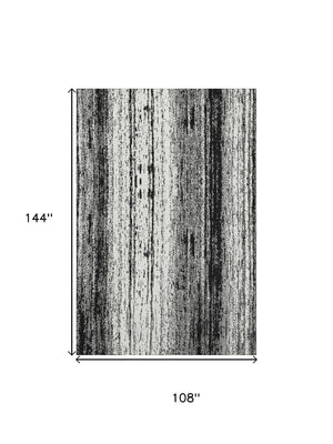 HomeRoots 9' x 12' Black and Ivory Striped Washable Area Rug with UV Protection, Stain Resistance & Comfort 668312