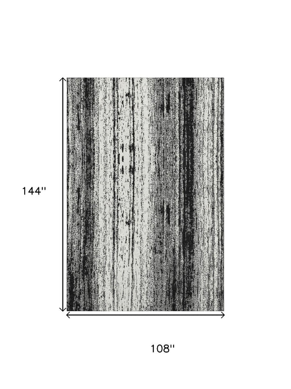 HomeRoots 9' x 12' Black and Ivory Striped Washable Area Rug with UV Protection, Stain Resistance & Comfort 668312