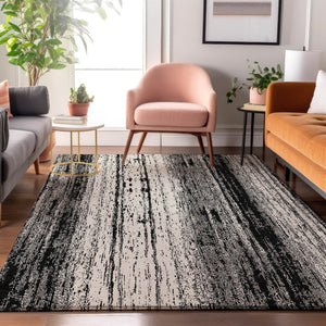 HomeRoots 10' X 14' Washable Black & Ivory Striped Area Rug with UV Protection for Modern High-Traffic Spaces 668313