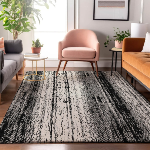 HomeRoots 10' X 14' Washable Black & Ivory Striped Area Rug with UV Protection for Modern High-Traffic Spaces 668313