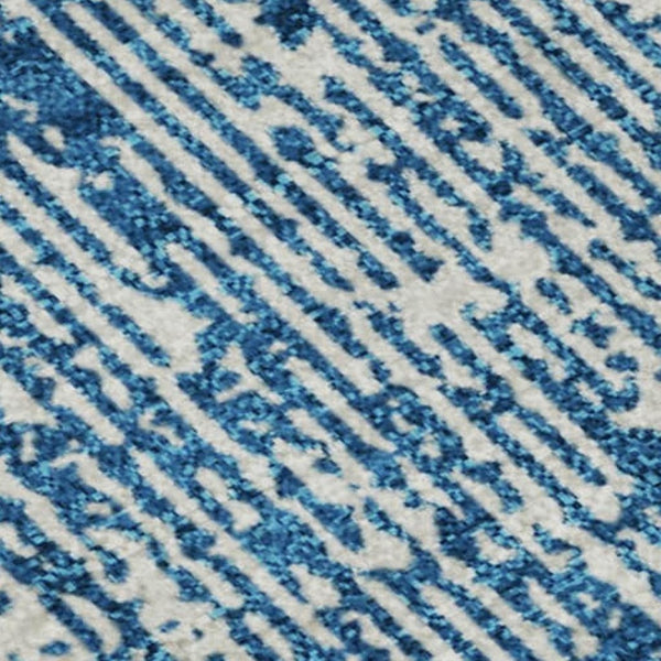 HomeRoots 8' X 10' Stylish Navy Blue & Ivory Striped Washable Area Rug with UV Protection for High-Traffic Spaces 668347