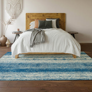 HomeRoots 9' X 12' Navy Blue & Ivory Striped Washable Area Rug with UV Protection for Kid & Pet-Friendly Homes 668348