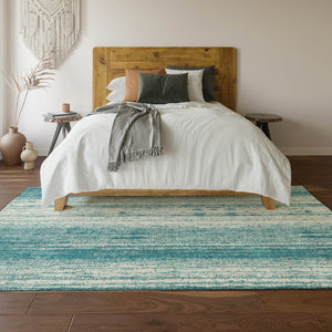 HomeRoots 8' X 10' Teal and Ivory Striped Area Rug - Durable, Washable, UV Protected for Indoor/Outdoor Use 668377