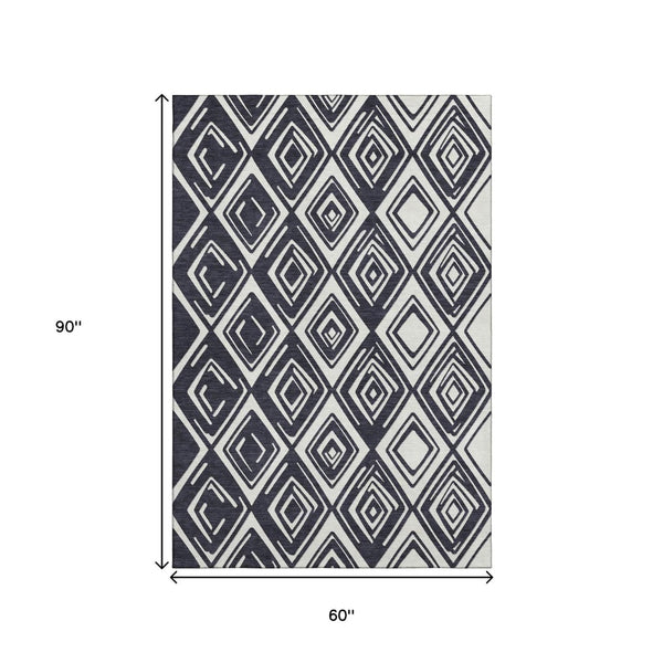 HomeRoots 5' X 8' Black And Ivory Geometric Area Rug - Washable, Stain-Resistant, UV-Protected for Busy Homes 668381