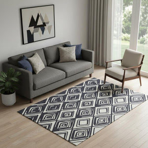 HomeRoots 5' X 8' Black And Ivory Geometric Area Rug - Washable, Stain-Resistant, UV-Protected for Busy Homes 668381