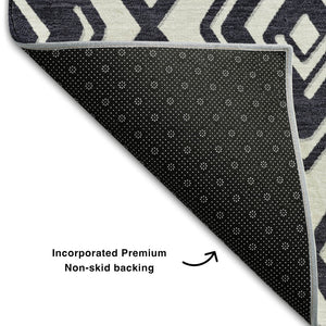 HomeRoots 8' Black and Ivory Geometric Round Rug - Washable, UV-Protected, Stain-Resistant for Modern Spaces 668382