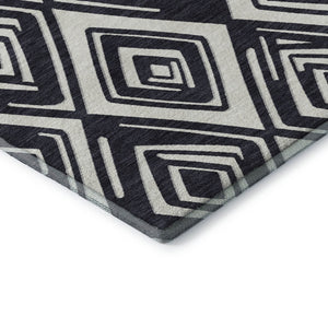 HomeRoots 8' Black and Ivory Geometric Round Rug - Washable, UV-Protected, Stain-Resistant for Modern Spaces 668382