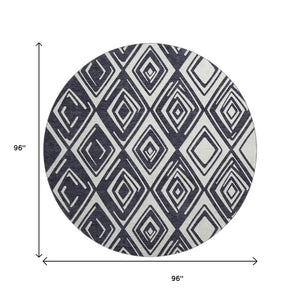 HomeRoots 8' Black and Ivory Geometric Round Rug - Washable, UV-Protected, Stain-Resistant for Modern Spaces 668382