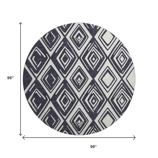 HomeRoots 8' Black and Ivory Geometric Round Rug - Washable, UV-Protected, Stain-Resistant for Modern Spaces 668382