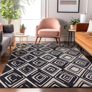 HomeRoots 8' X 10' Black And Ivory Geometric Area Rug - Washable, UV-Protected, Perfect for Modern Homes! 668383