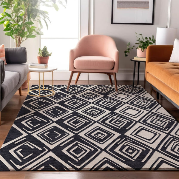HomeRoots 8' X 10' Black And Ivory Geometric Area Rug - Washable, UV-Protected, Perfect for Modern Homes! 668383