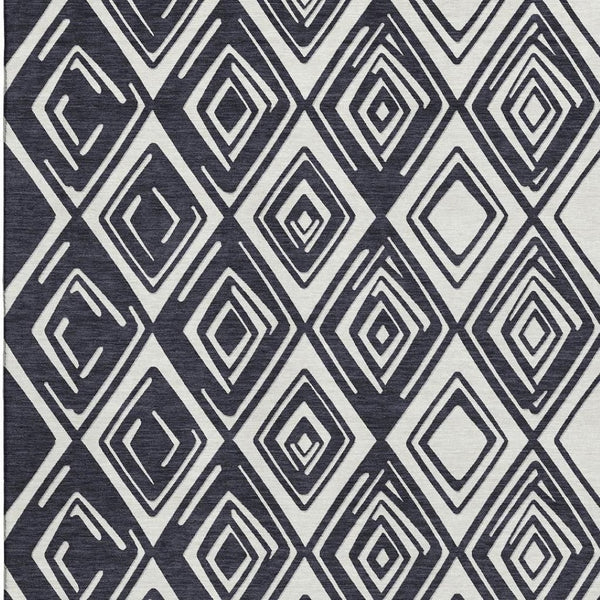 HomeRoots 8' X 10' Black And Ivory Geometric Area Rug - Washable, UV-Protected, Perfect for Modern Homes! 668383