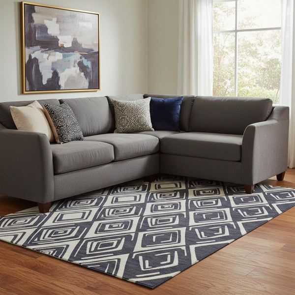 HomeRoots 9' X 12' Black And Ivory Geometric Area Rug – Washable, UV Protected, Modern & Durable Design for Homes 668384
