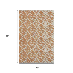 HomeRoots 5' X 8' Geometric Rust and Ivory Washable Area Rug with UV Protection - Stylish, Durable, and Easy Care! 668423