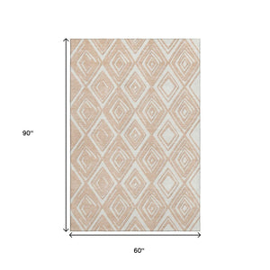 HomeRoots 5' X 8' Peach & Ivory Geometric Washable Area Rug | UV Protection & Durable Design for High Traffic Areas 668429