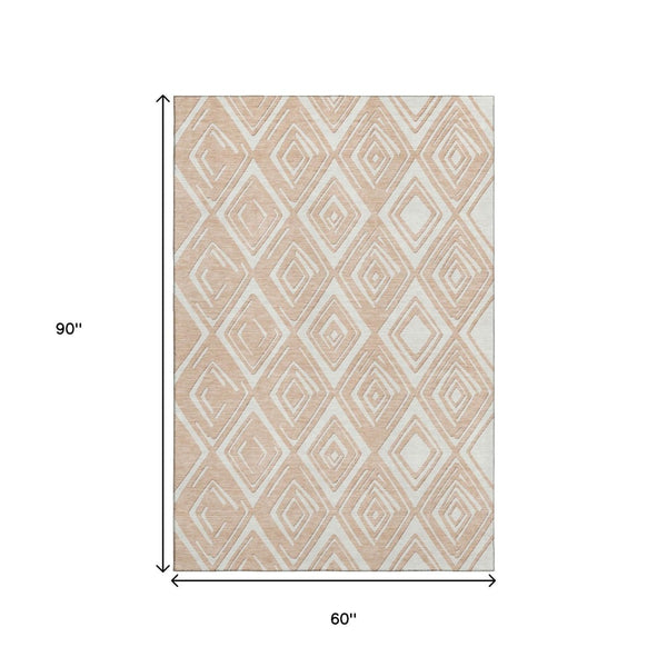 HomeRoots 5' X 8' Peach & Ivory Geometric Washable Area Rug | UV Protection & Durable Design for High Traffic Areas 668429