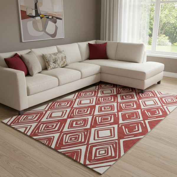 HomeRoots 10' X 14' Red And Ivory Geometric Area Rug - Washable, UV Protected, Durable for High-Traffic Spaces 668445