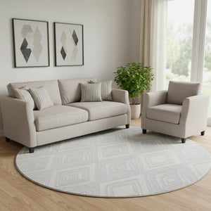 HomeRoots 8' Silver and Ivory Geometric Round Rug - Washable, UV-Protected, Durable for High-Traffic Areas 668448