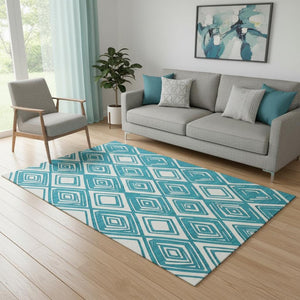 HomeRoots 5' X 8' Teal and Ivory Geometric Area Rug – Washable, UV-Protected, Stylish & Pet-Friendly Design! 668459