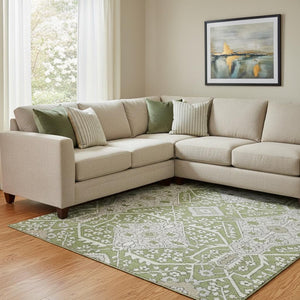 HomeRoots 9' X 12' Floral Area Rug in Artichoke Green, Ivory & Gray – Washable, UV-Protected, Durable Design 668476